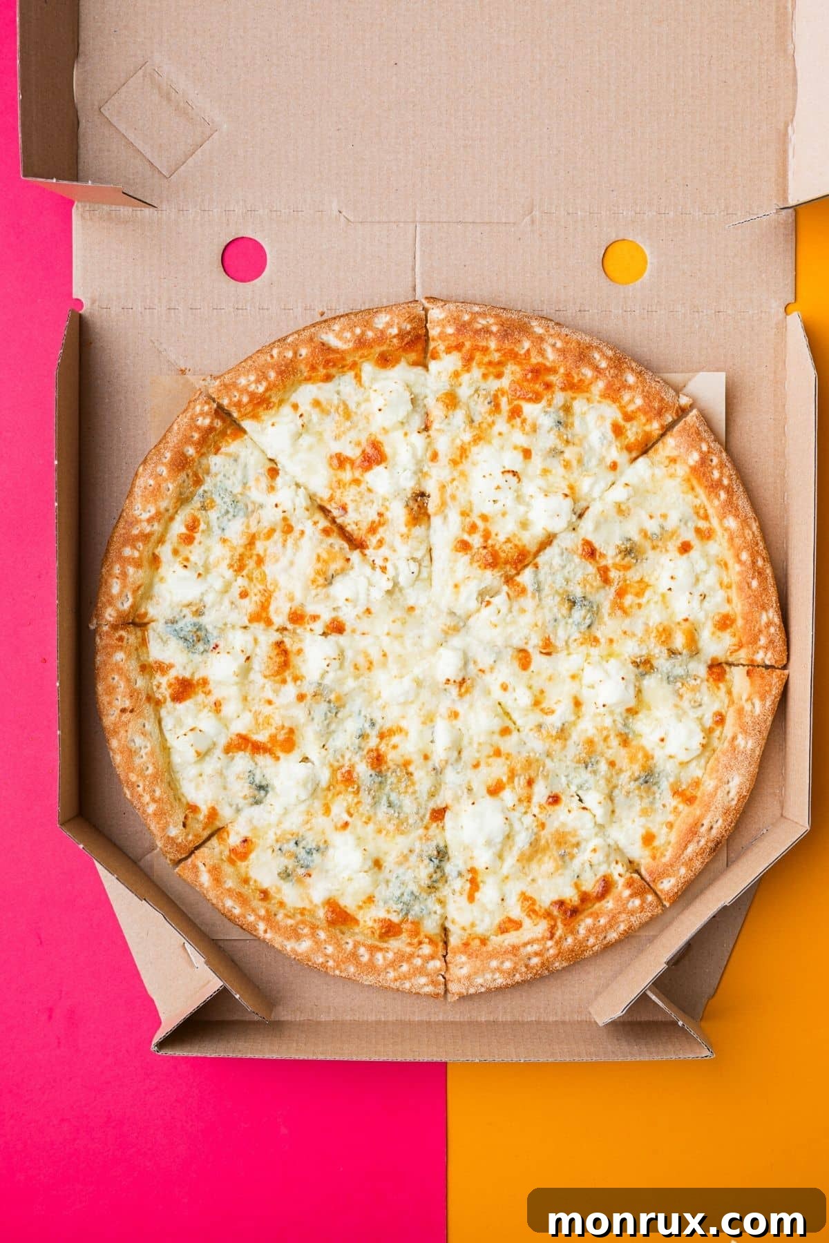 pizza in a cardboard box.