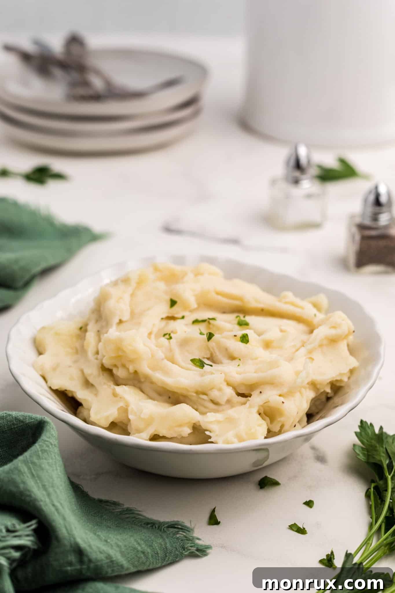 A beautifully presented bowl of creamy Whole30 mashed potatoes, ready to be served.