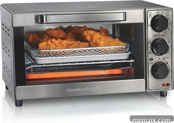 The Hamilton Beach Sure-Crisp Air Fryer Countertop Toaster Oven, a versatile kitchen appliance that combines air frying, toasting, and dehydrating functions.