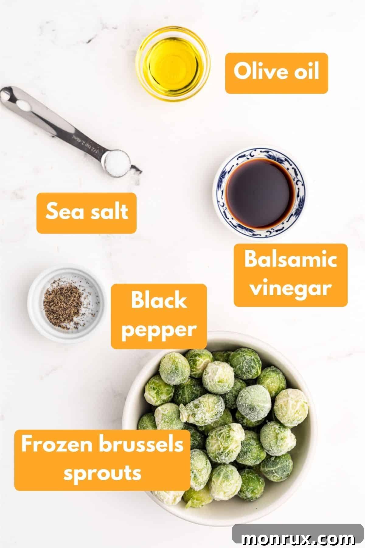 Ingredients laid out for air frying frozen brussels sprouts: frozen sprouts, olive oil, balsamic vinegar, salt, pepper.
