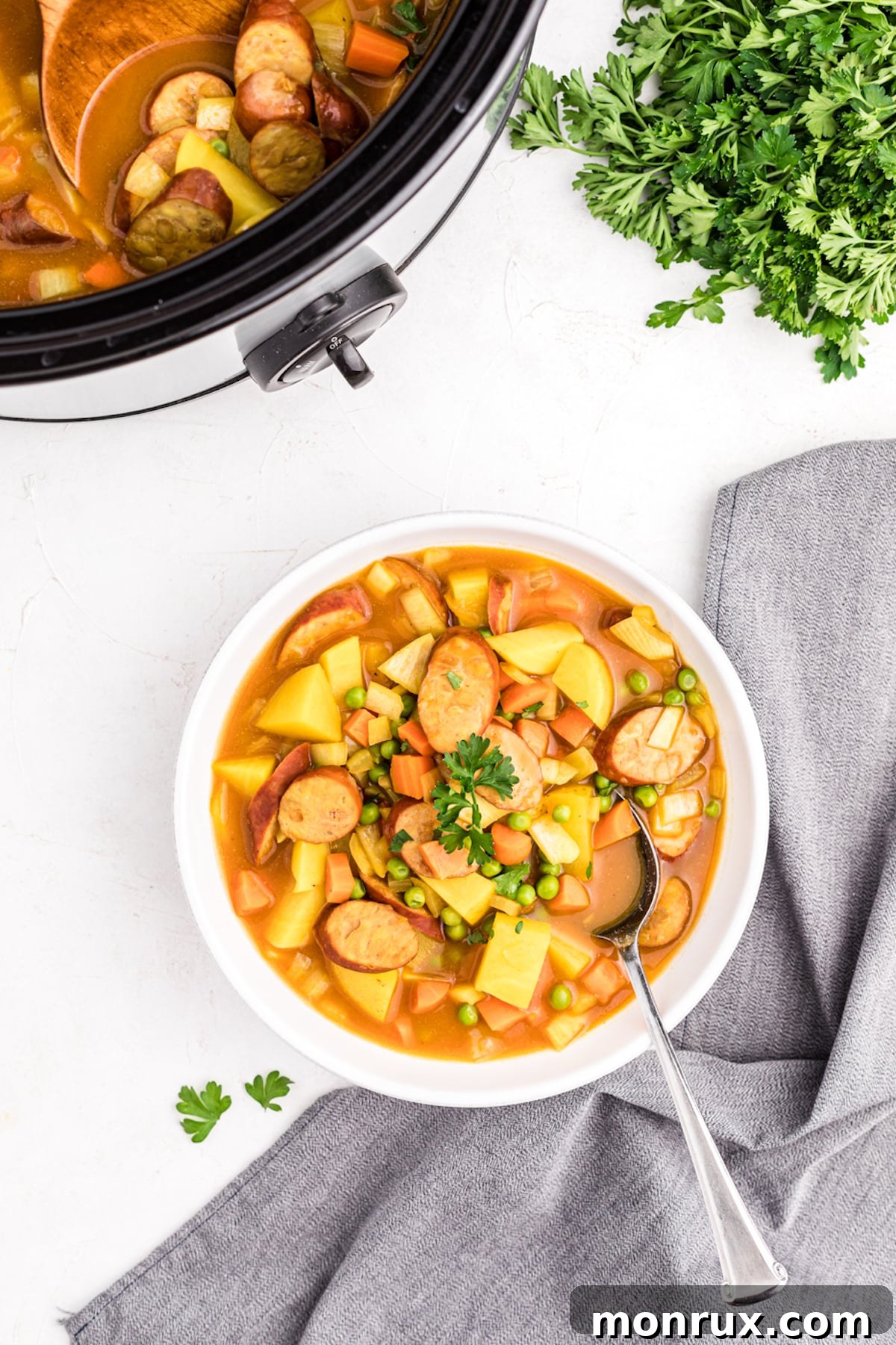 A beautifully presented bowl of Slow Cooker Sausage Curry, ready to be enjoyed.