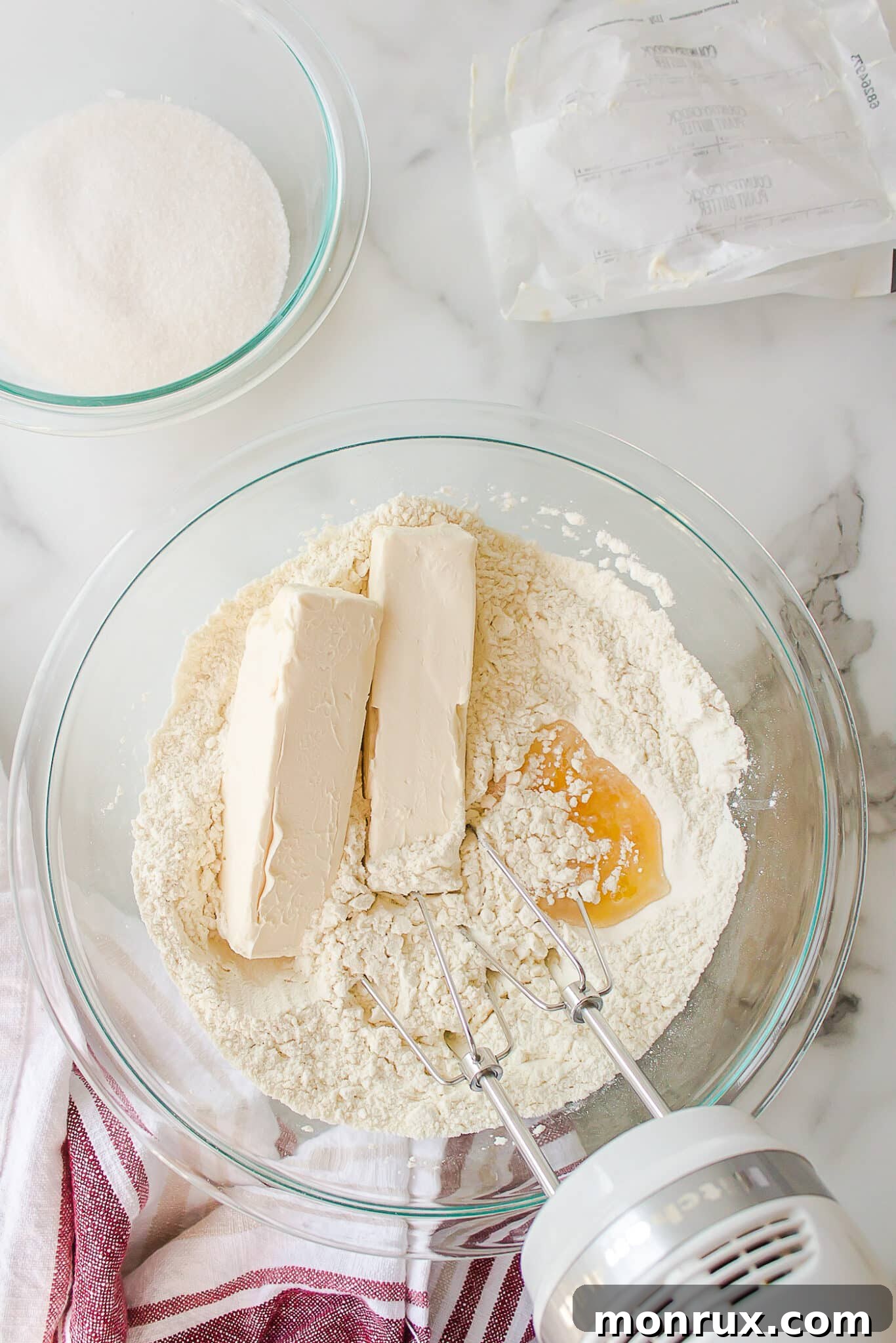 Ingredients for dairy-free sugar cookies combined in a mixing bowl.