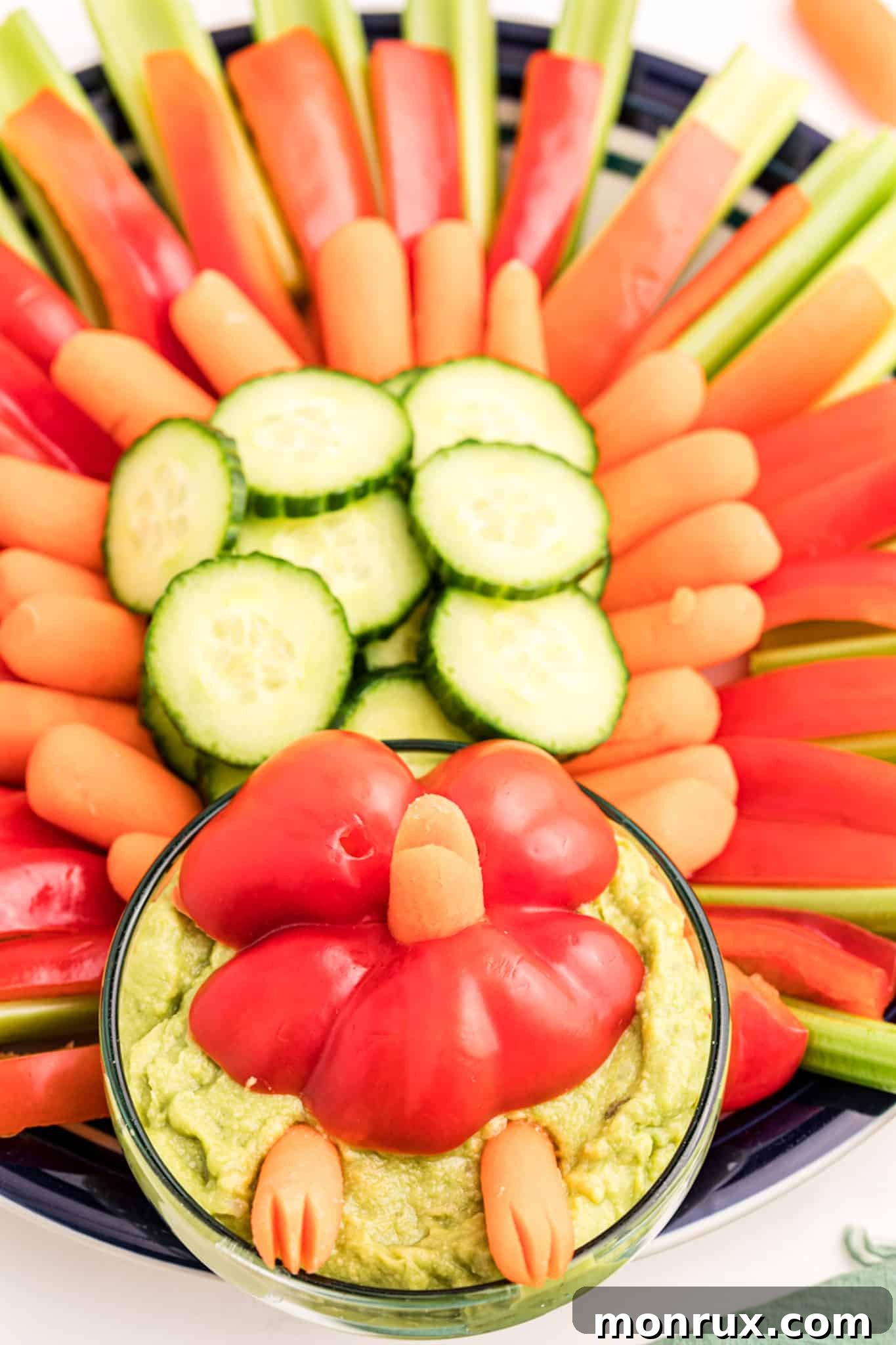 A fully assembled turkey-shaped vegetable platter, vibrant and festive for Thanksgiving.