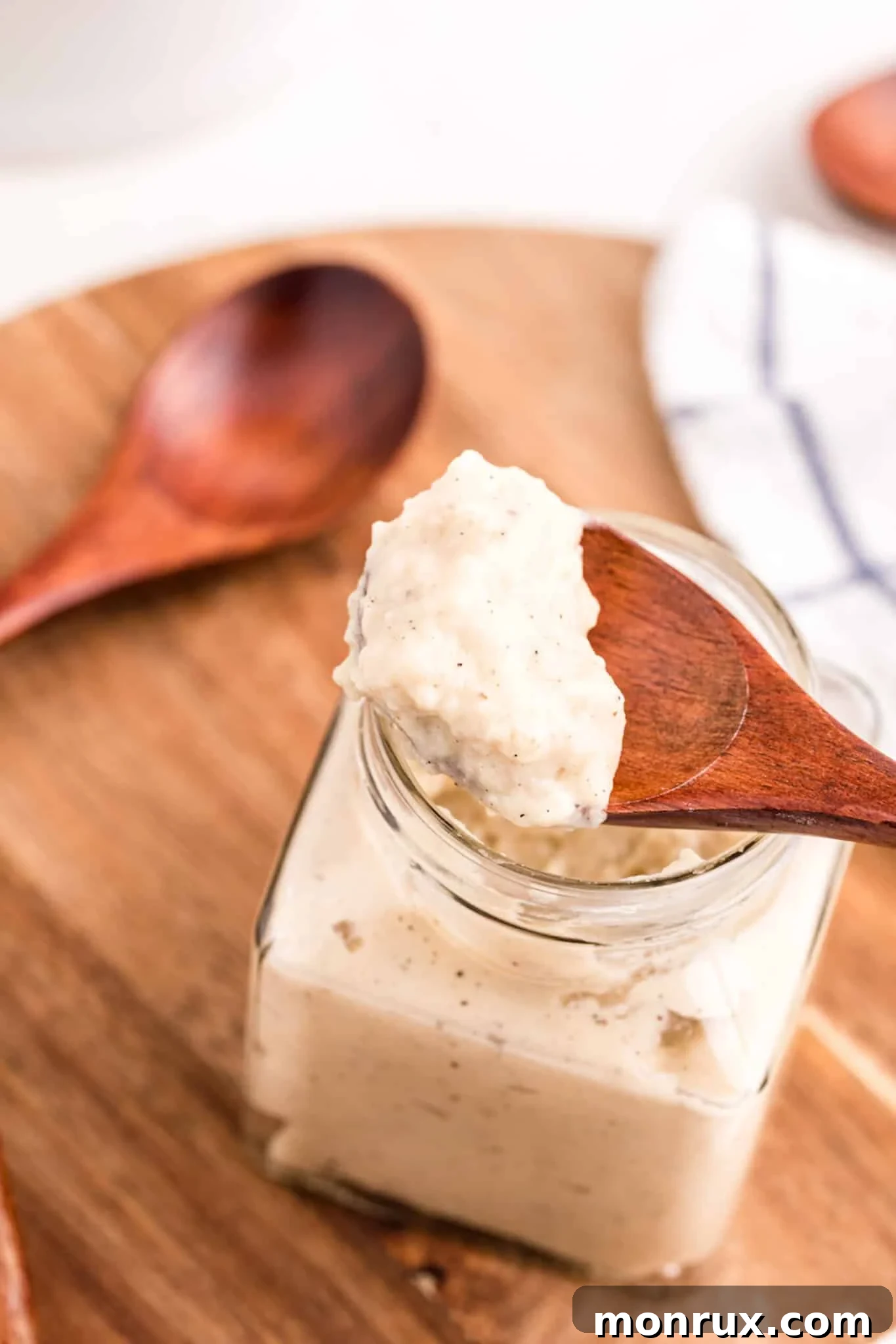 Finished gluten-free dairy-free cream of chicken soup in a glass jar, ready for use or storage.