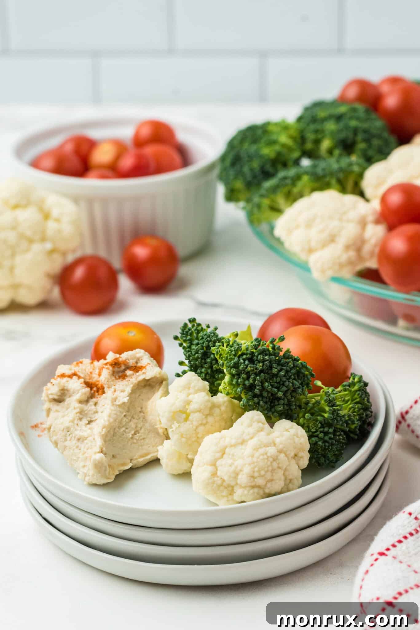 A close-up of a serving of fresh vegetables and hummus from the Christmas appetizer wreath.
