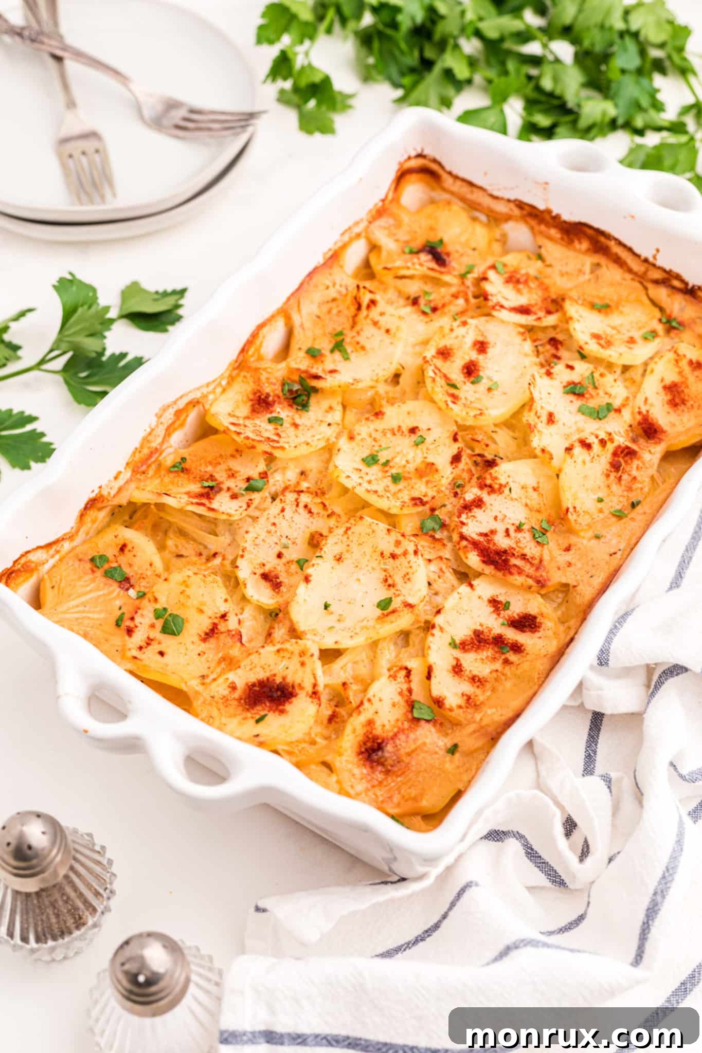 gluten-free and dairy-free scalloped potatoes in a serving dish.
