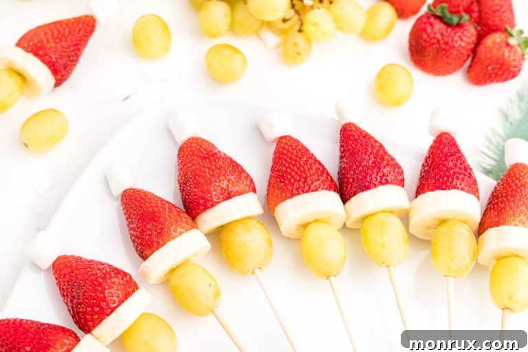 close up of assembled Grinch fruit kabobs