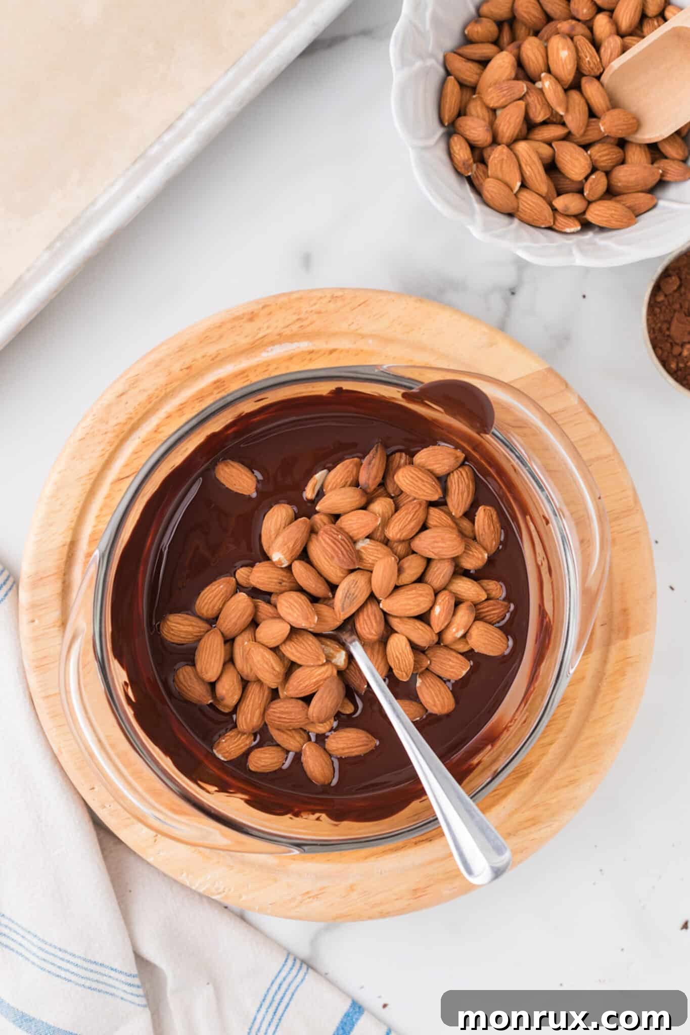 almonds in melted dark chocolate.