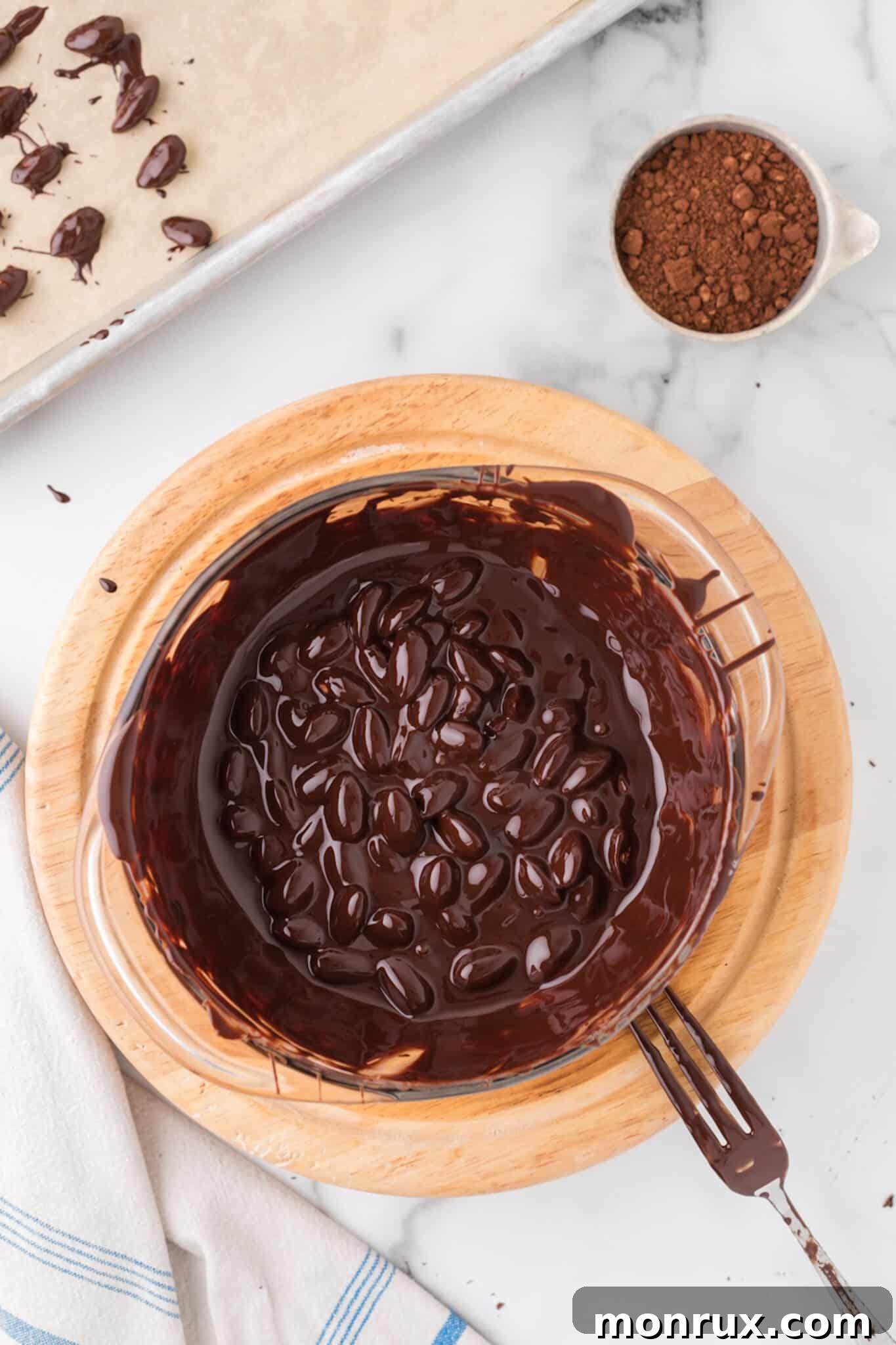 vegan dark chocolate covered almonds process shot.