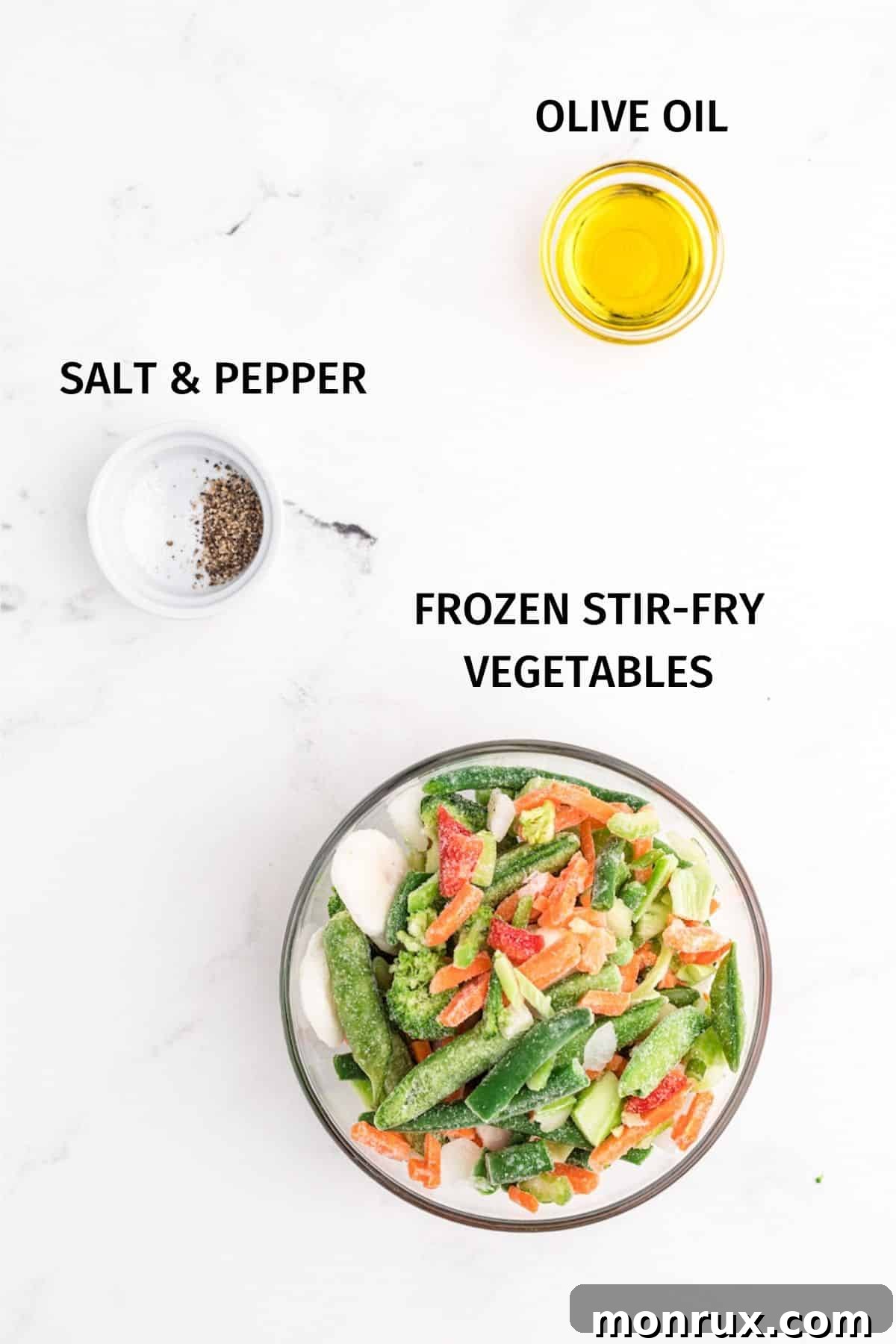 Ingredients for air fryer frozen vegetables laid out on a surface.