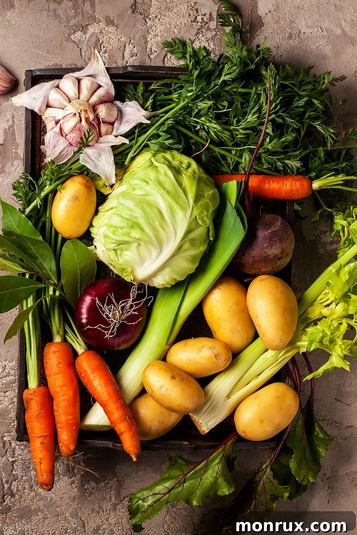 An array of colorful gluten-free starchy root vegetables arranged on a platter.