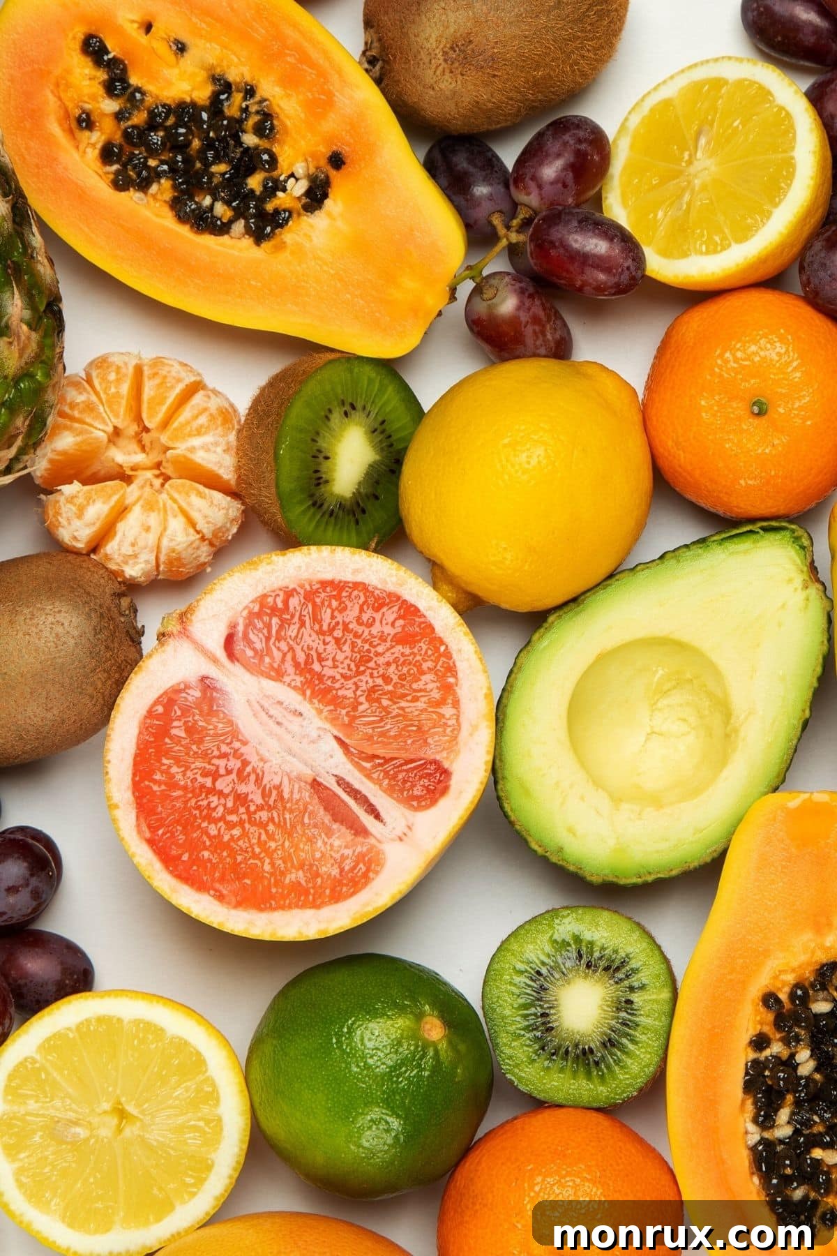 A vibrant assortment of colorful fresh fruits displayed on a table, highlighting natural gluten-free options.