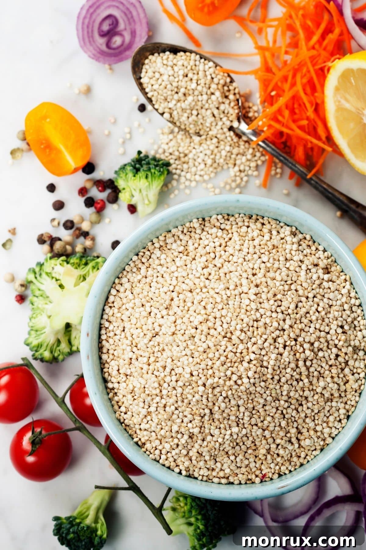 A wooden bowl filled with uncooked quinoa grains, highlighting its natural form.