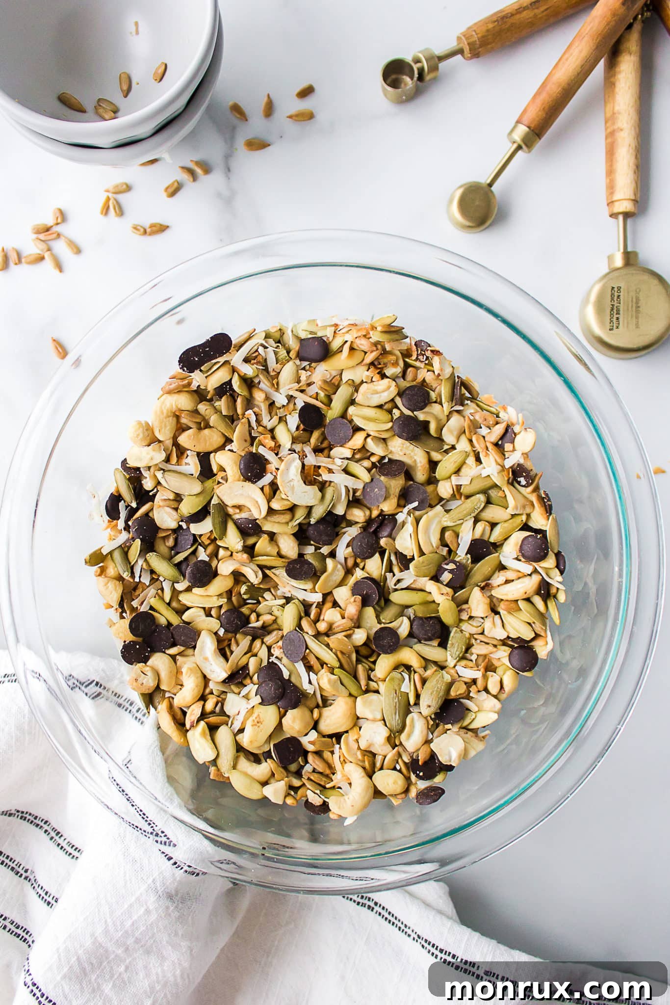 A vibrant bowl of freshly mixed sugar-free trail mix, ready to be served or stored.