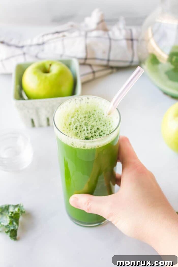 freshly poured kale juice in a glass.