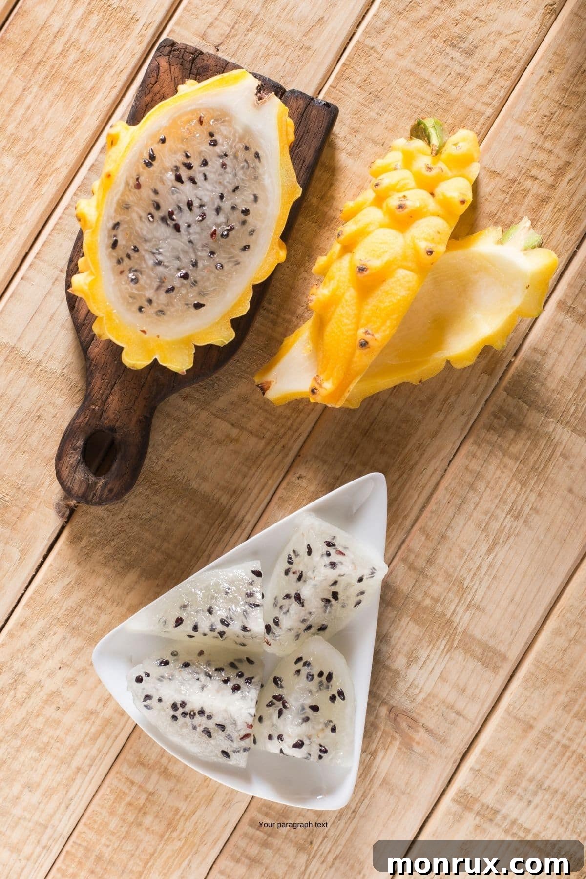 Yellow dragon fruit cut open on a table.