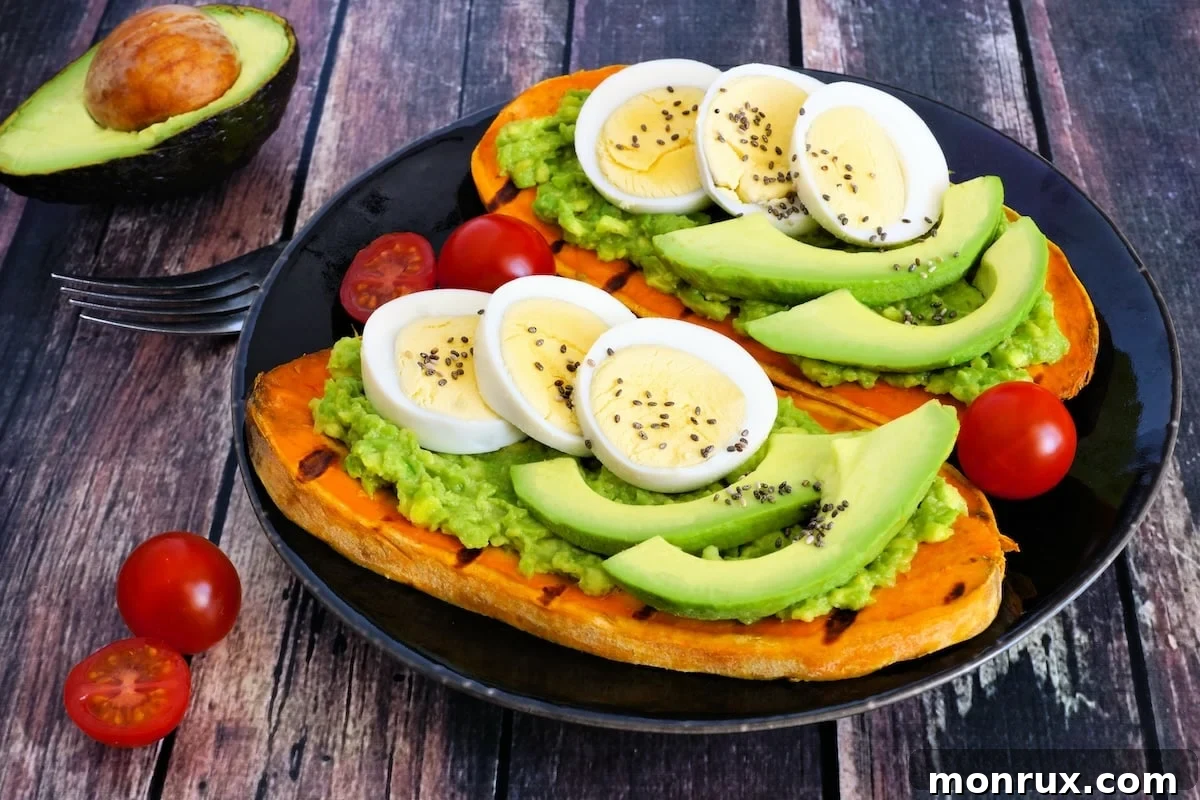 Sweet potato toasts topped with avocado and eggs.