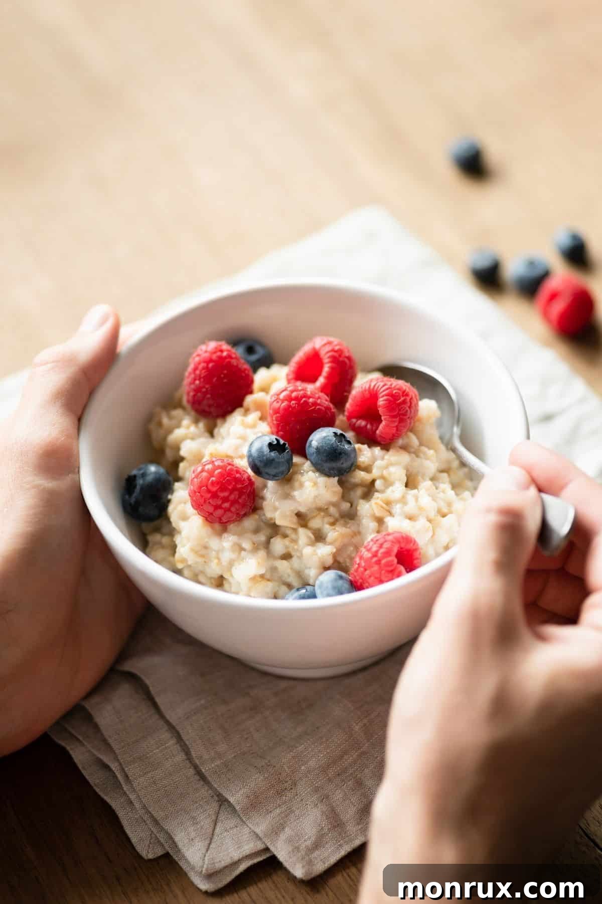 Bowl of oatmeal with berries.