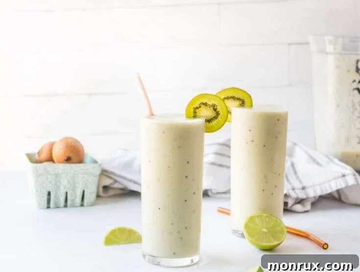 Two glasses of gut health smoothie with yogurt.