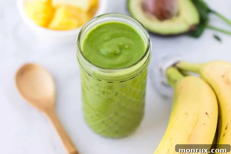 Liver detox green smoothie in a glass jar.