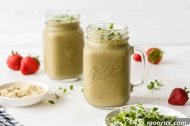 Broccoli sprout smoothie on a wooden table.