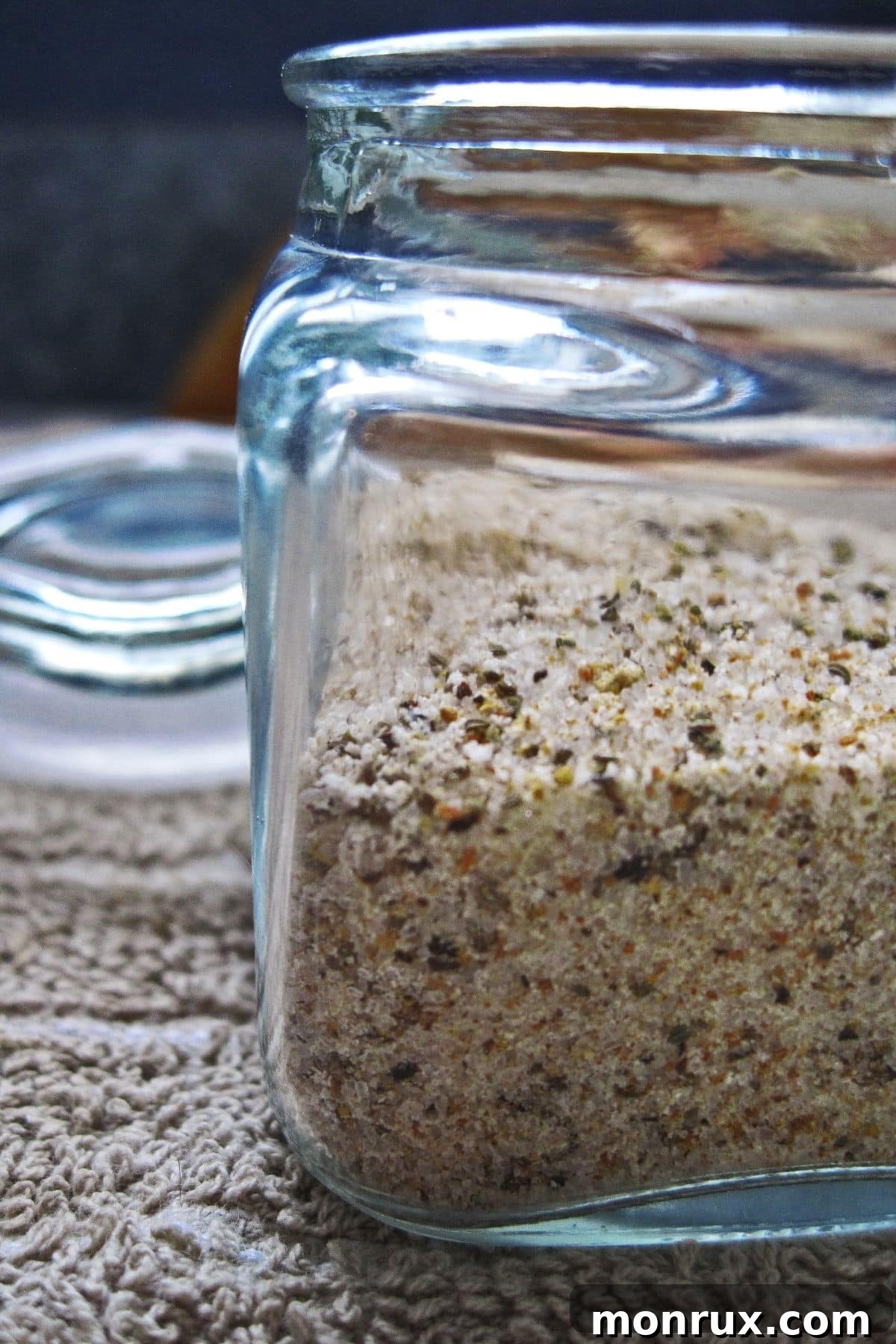 Clear glass container of Seasoning salt.