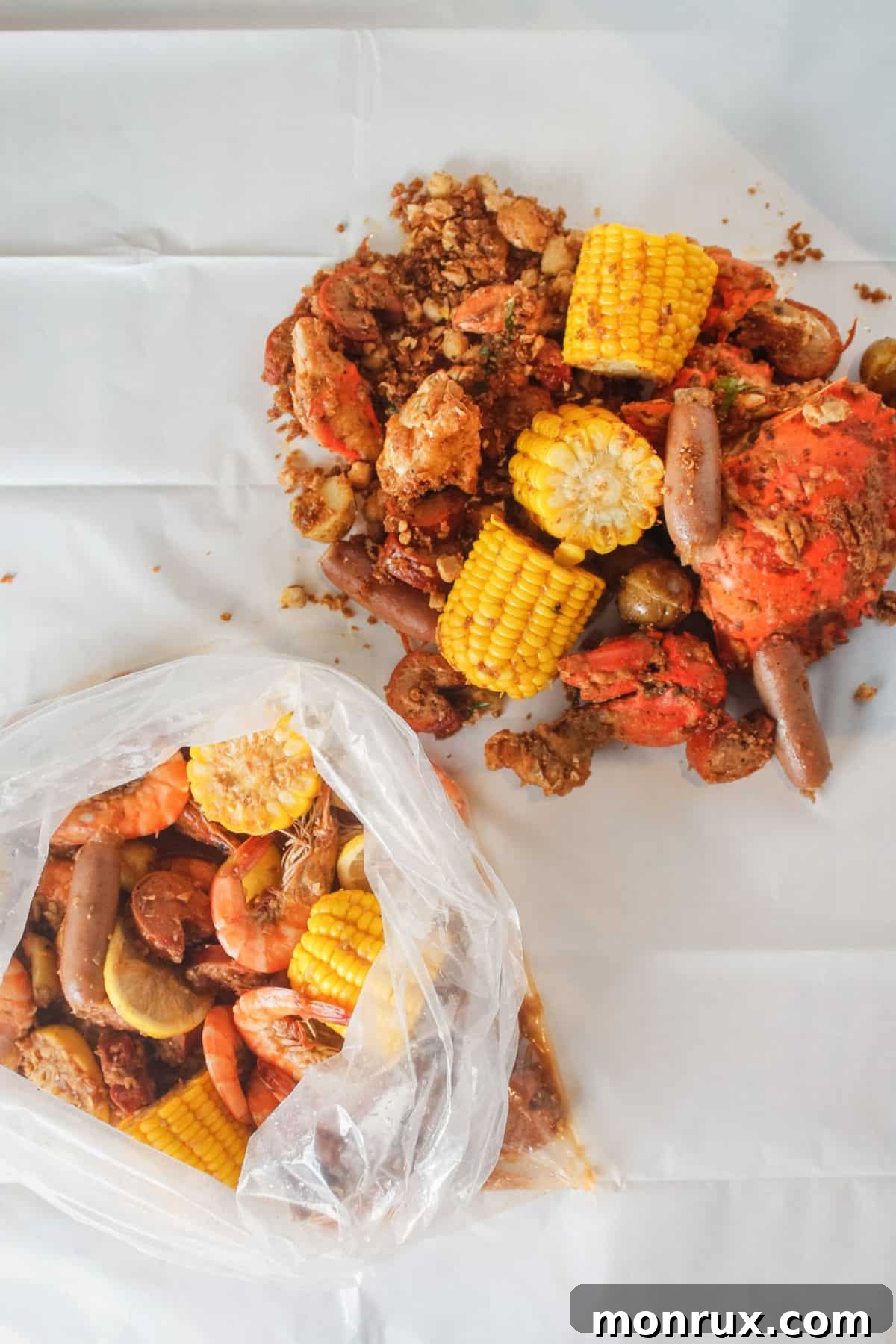 Crab boil with corn, shrimp, and seasonings.