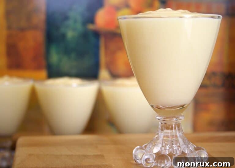 Glass serving cups of instant pudding.