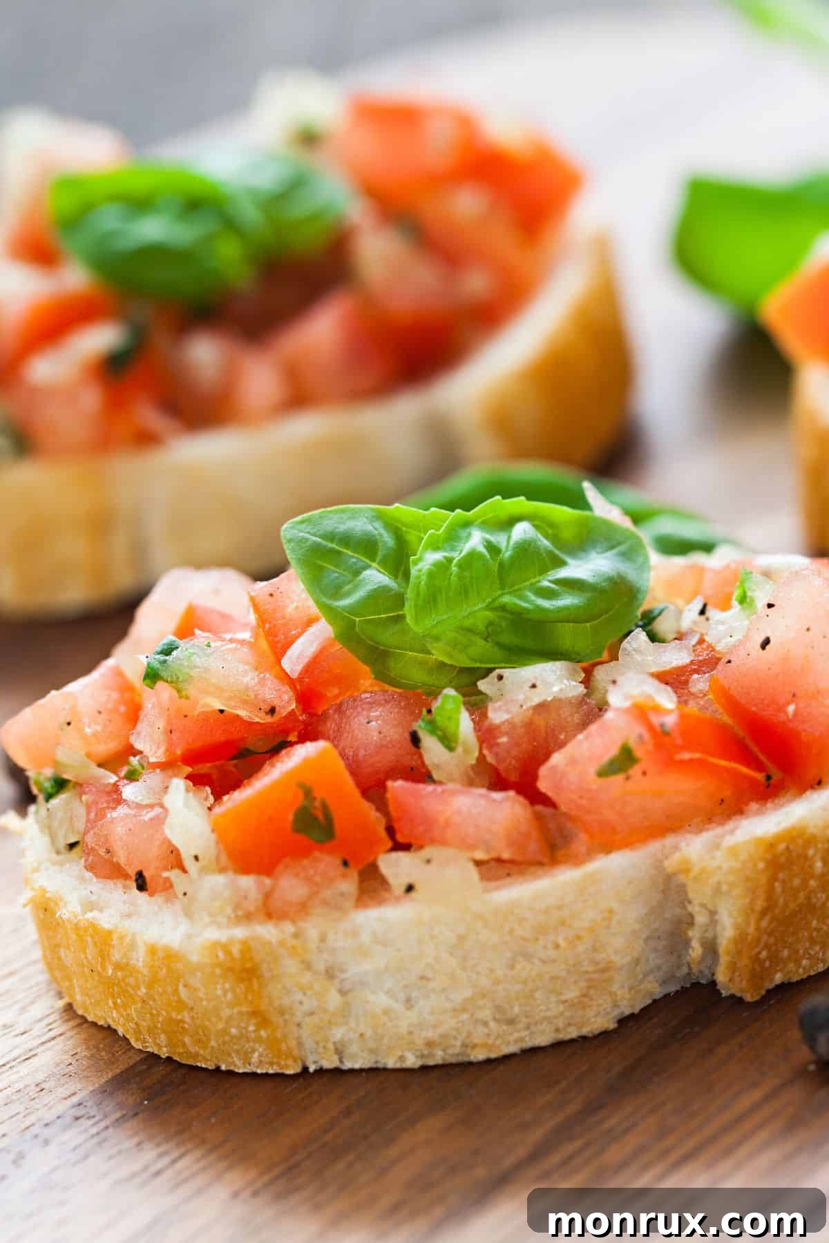 basil on bruschetta toast.