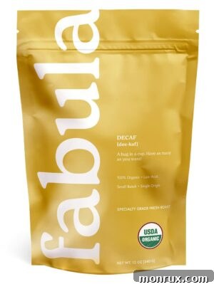 A bag of Fabula Coffee, emphasizing its decaffeinated and low acid qualities, perfect for a gentle brew.