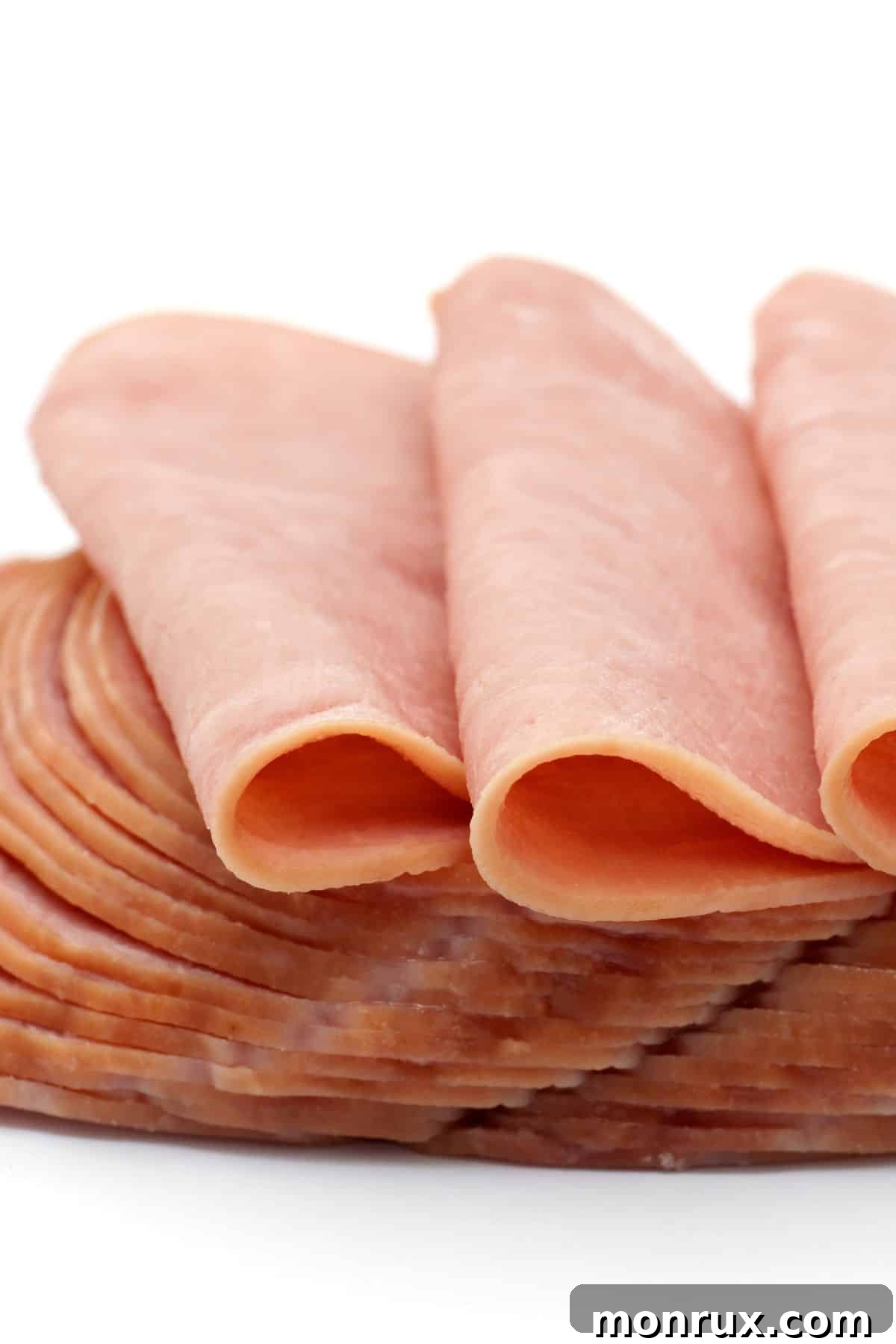 A stack of thinly sliced deli meats, an easy protein source for soft diets.