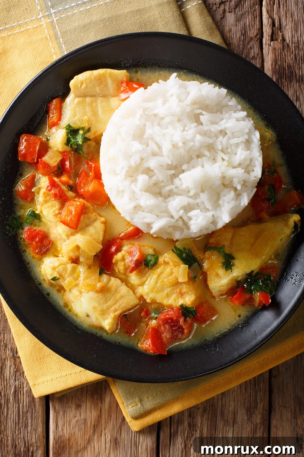 A bowl of Instant Pot Coconut Mahi Mahi Stew, a tender and flavorful fish dish.