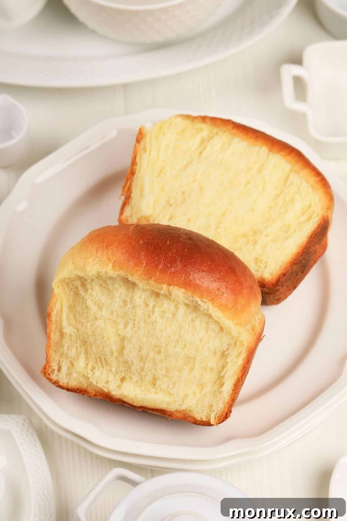 Soft white bread slices on a plate, suitable for a modified soft diet.