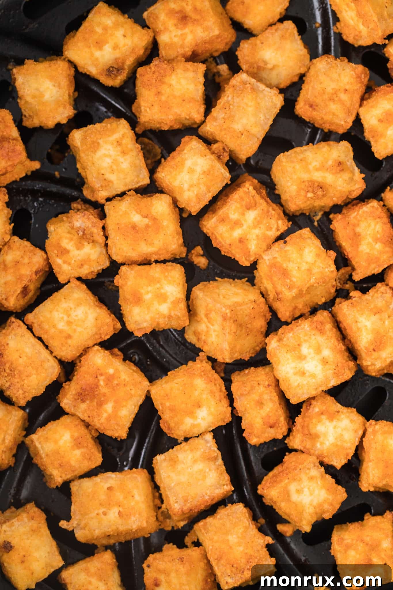 Crispy air fryer tofu cubes, a versatile protein source for various diets.