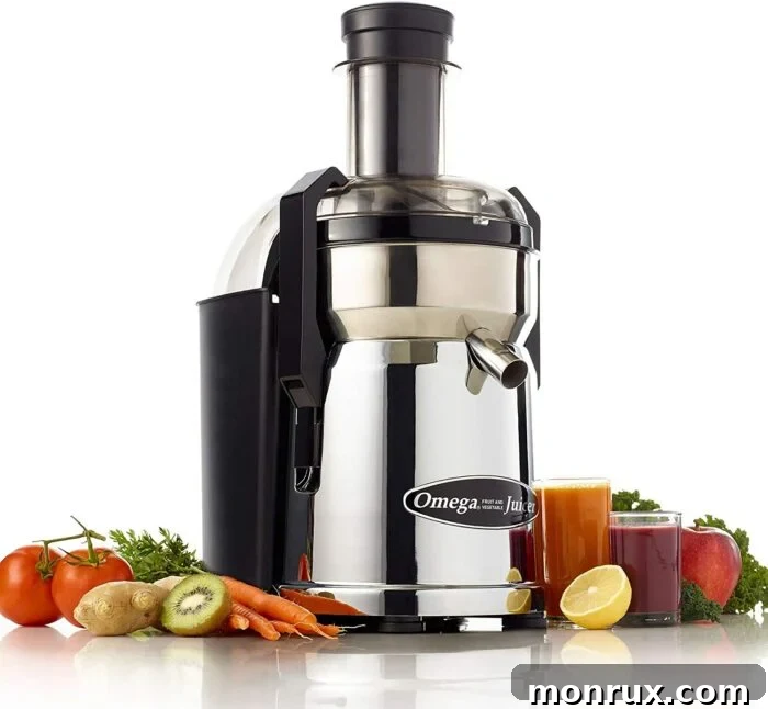 An Omega MMC500C Commercial Juicer, a large, powerful centrifugal juicer designed for high volume.