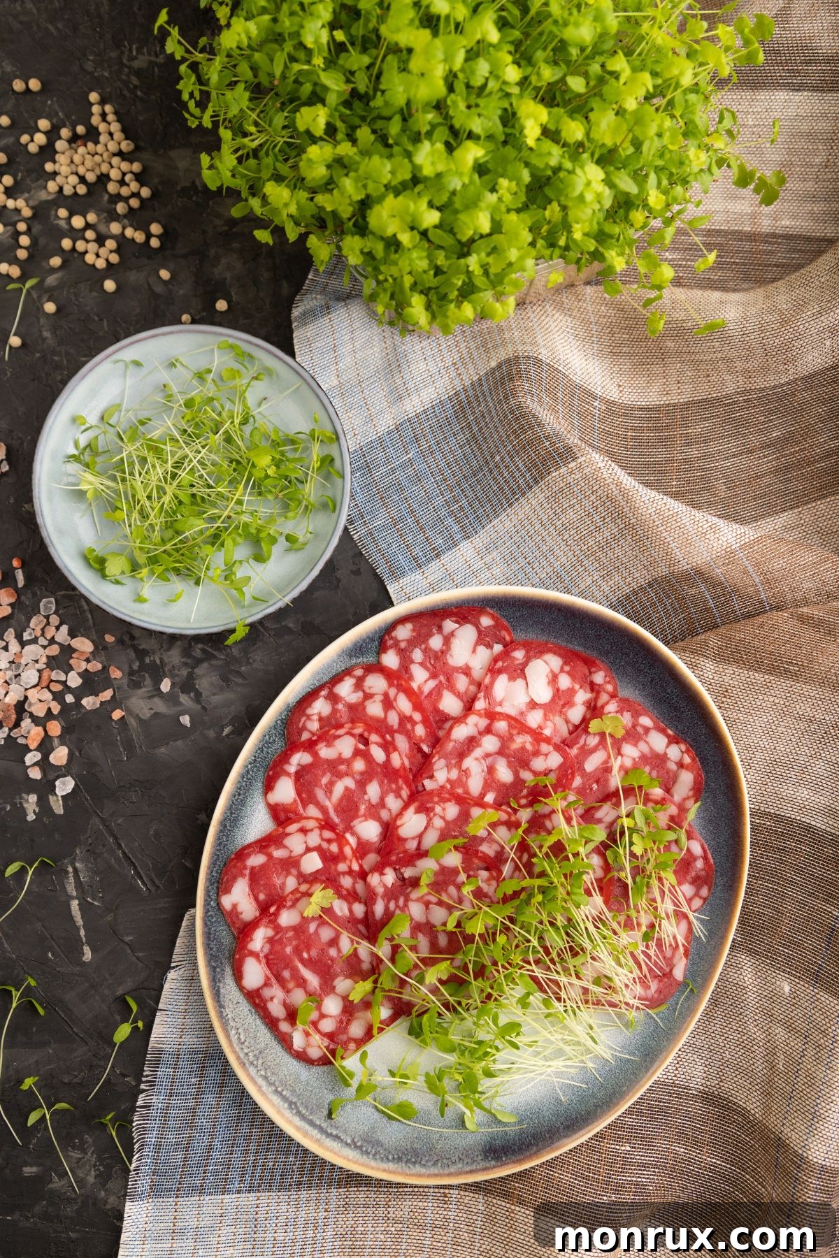 Spinach microgreens elegantly arranged on a plate of fresh food, highlighting their versatility as a garnish and ingredient.