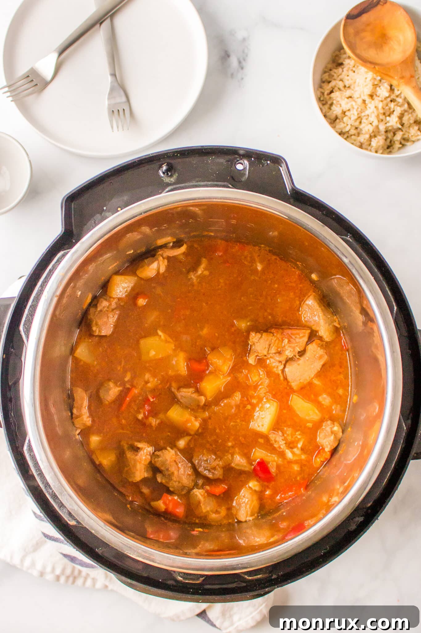 Sweet and sour pork in the liner of an Instant Pot.