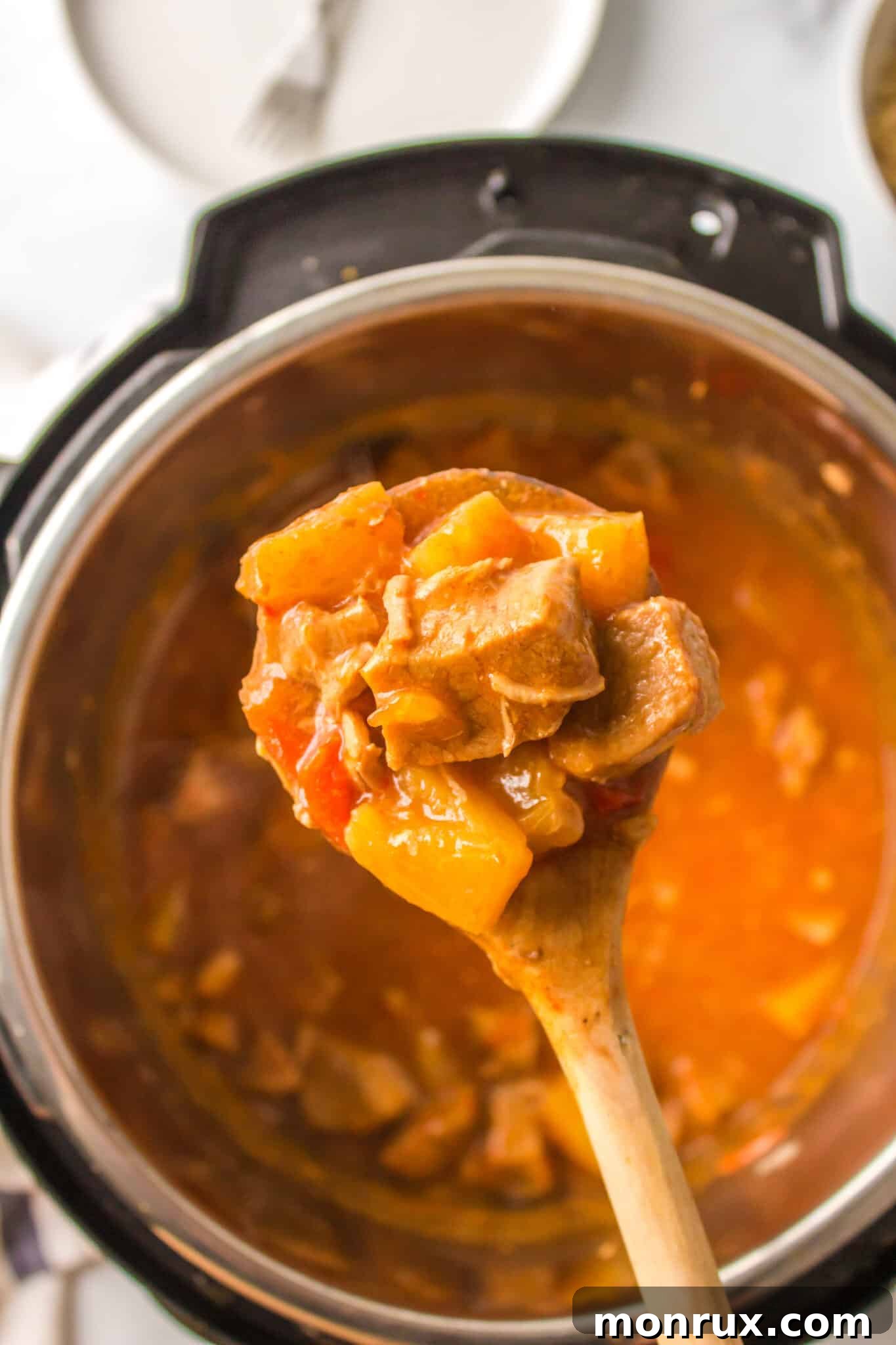 spoonful of instant pot sweet and sour pork recipe.