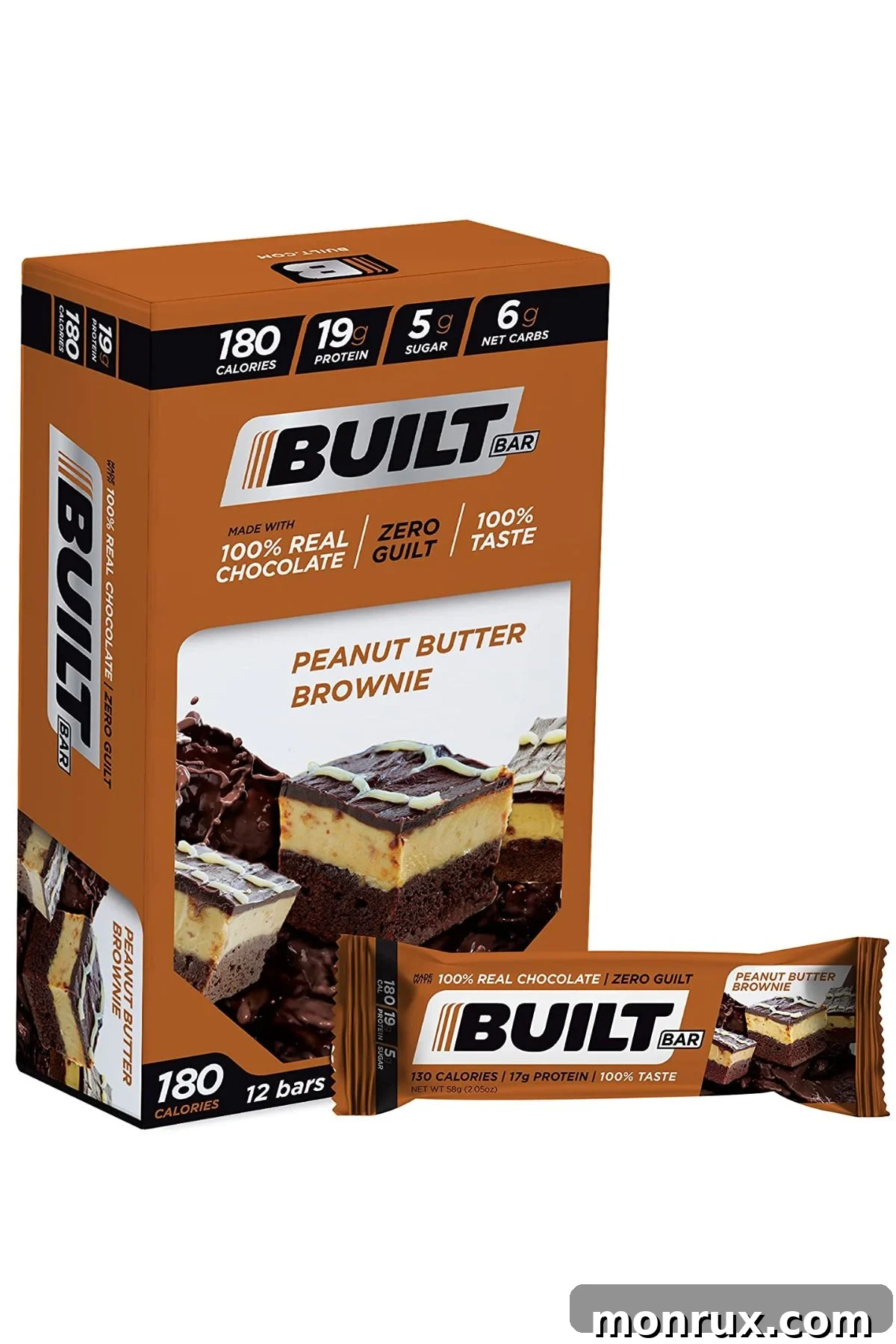 A Built Bar next to a box of bars, highlighting the product packaging and design.