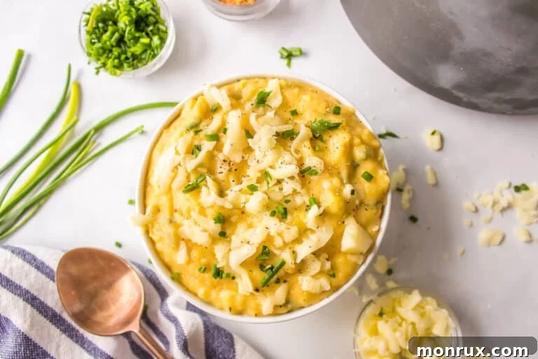 A bowl of Mexican mashed potatoes, beautifully garnished.