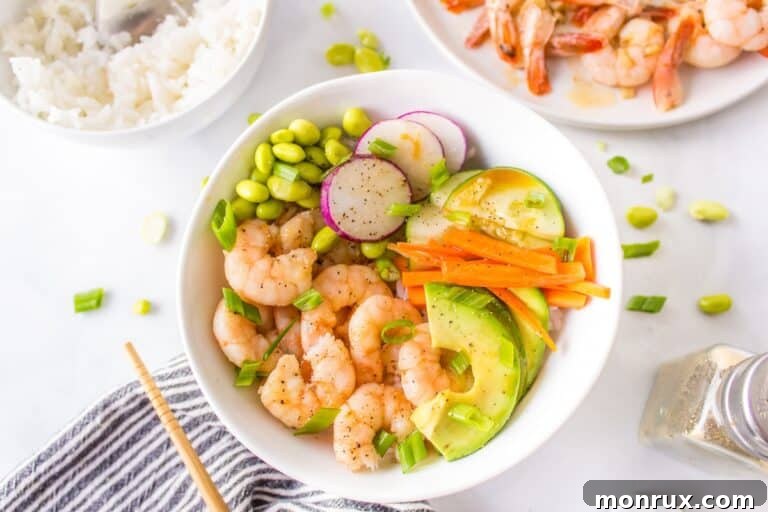 A beautifully arranged shrimp poke bowl, ready to eat.