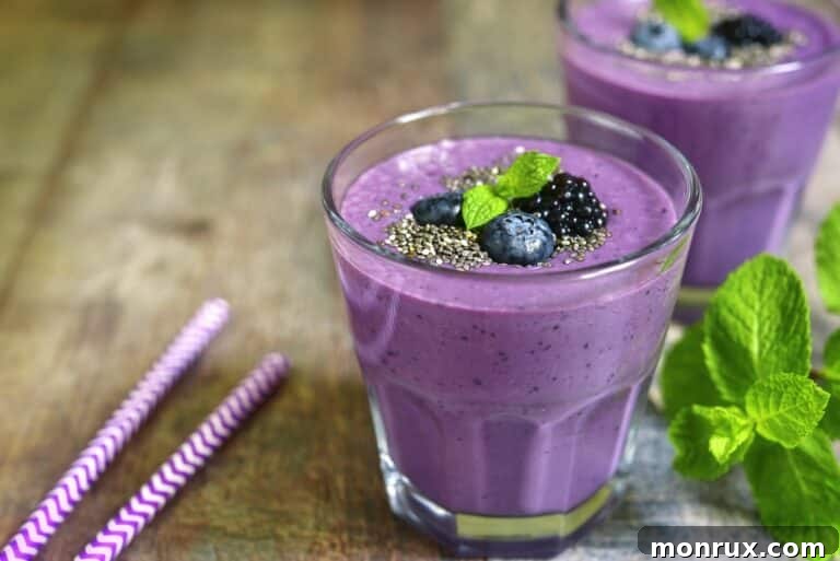 two glasses of blackberry chia smoothie.