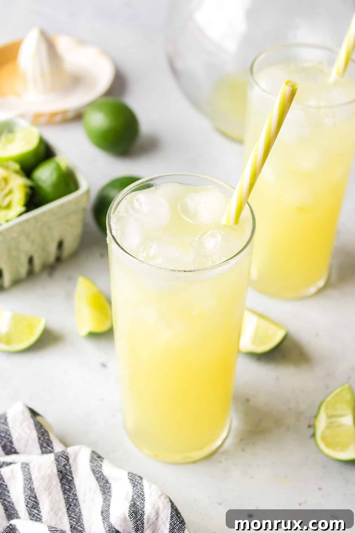 A beautifully garnished glass of sparkling Pineapple Ginger Beer Mocktail, brimming with ice and vibrant colors.