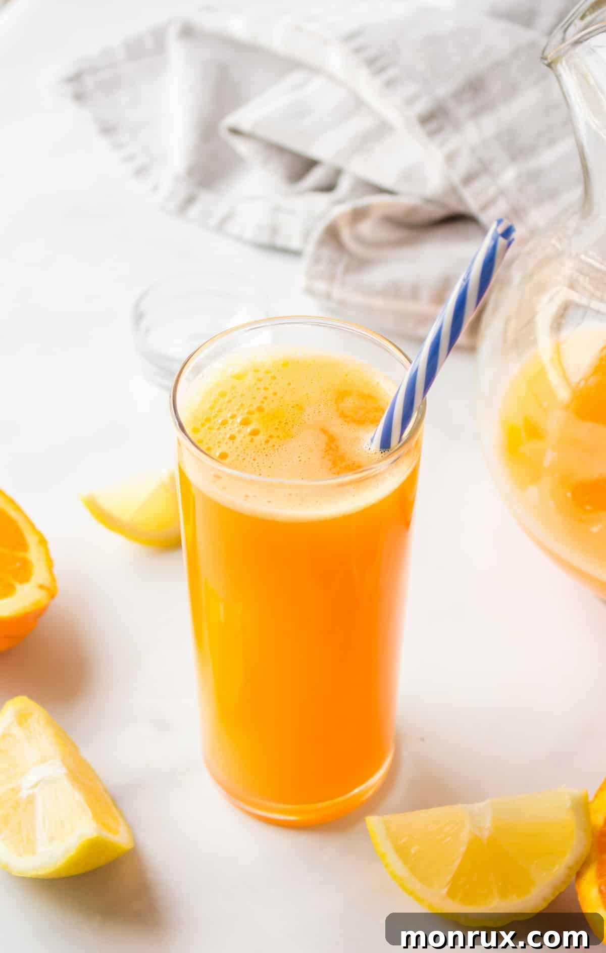A refreshing glass of vibrant yellow juice, garnished for a healthy start.