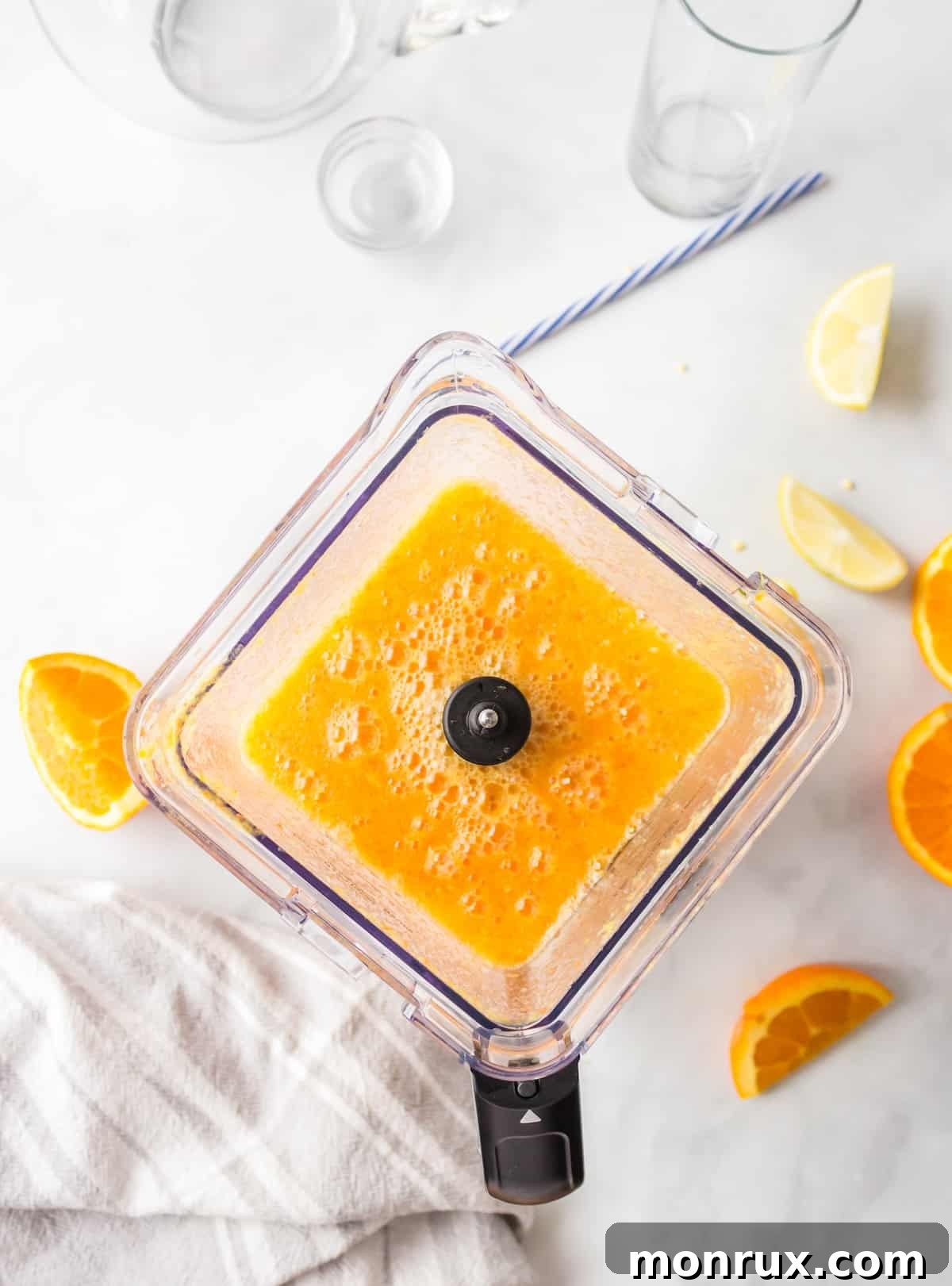 All juice ingredients blended smooth in a blender, showing a rich, consistent texture.