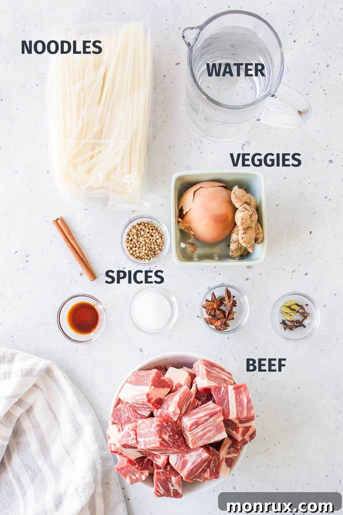 Essential ingredients laid out for making delicious crockpot beef pho.