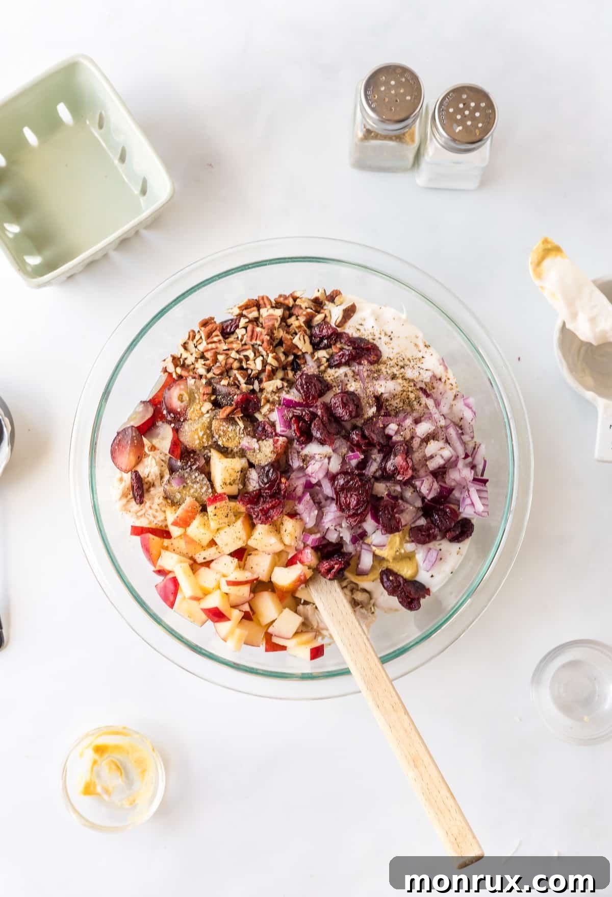 All diced ingredients for Apple Pecan Chicken Salad in a mixing bowl.