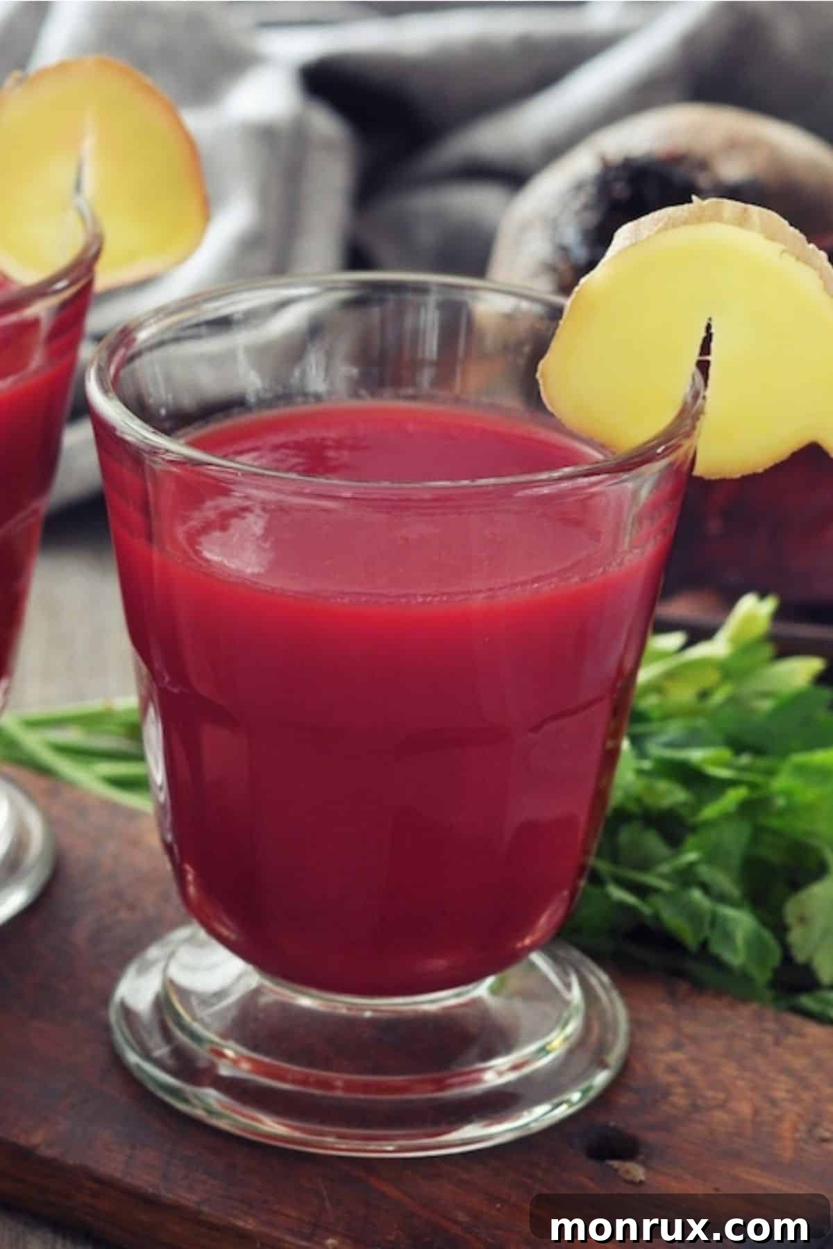 A vibrant glass of freshly made Beet Ginger Juice, ready to be enjoyed.