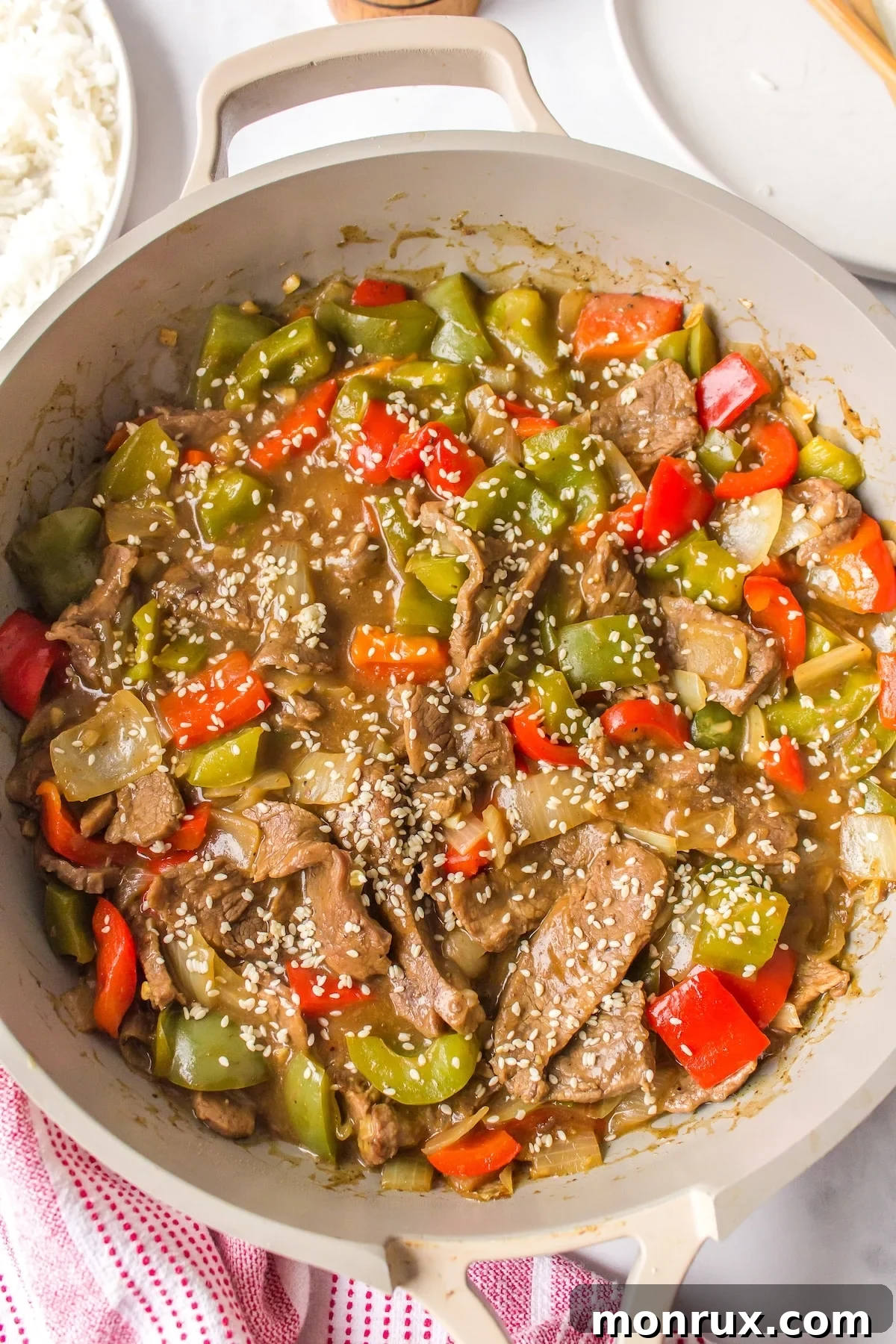 Anti-inflammatory recipe being prepared in a skillet with fresh ingredients.